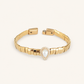 Bracelete dourado de canutilhos e gota pérola